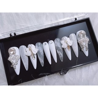 Nail thiết kế sơn gel đính nơ, đá, phối mắt mèo thạch loang, nail cô dâu