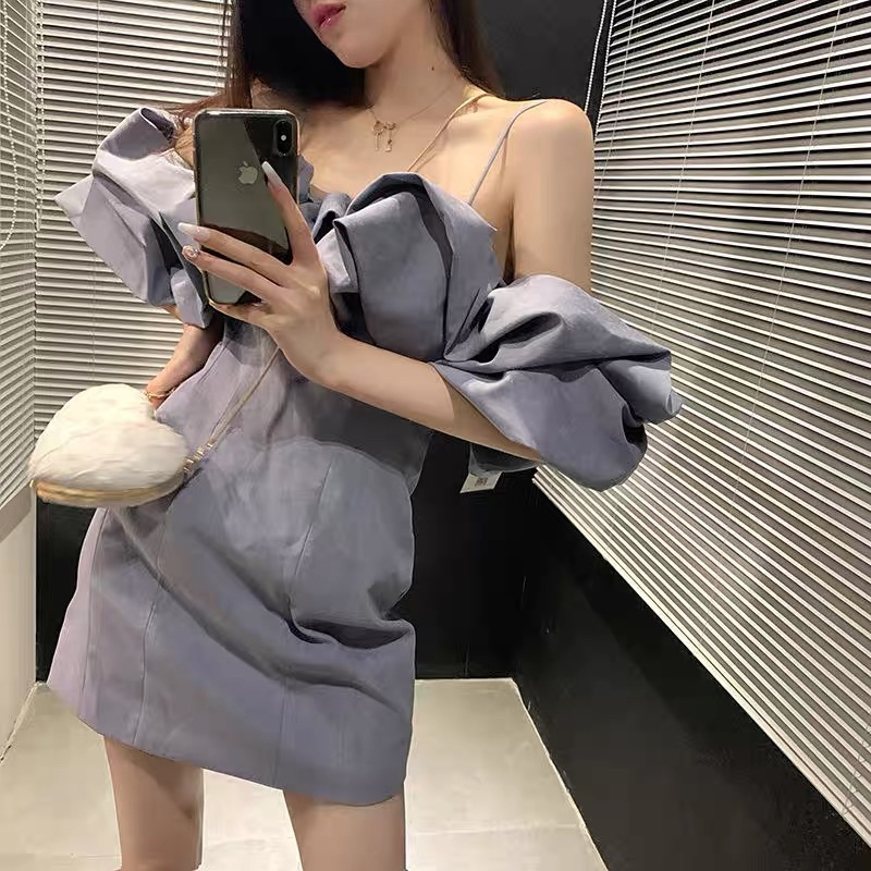 Đầm xinh thiết kế phần tay bồng lưng bo chun