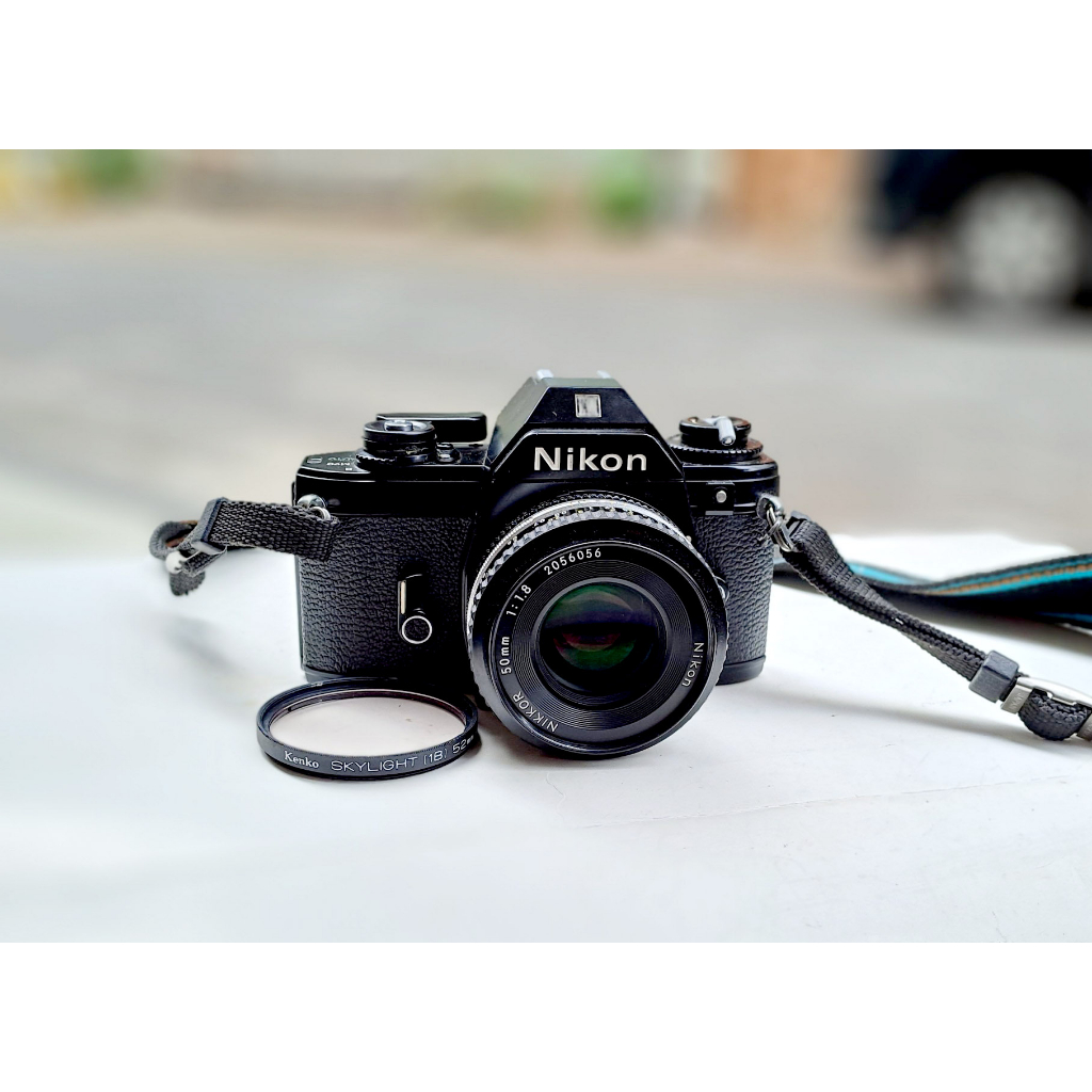 Máy nikon EM + 50 f/1.8 like new bỏ film vào là chụp