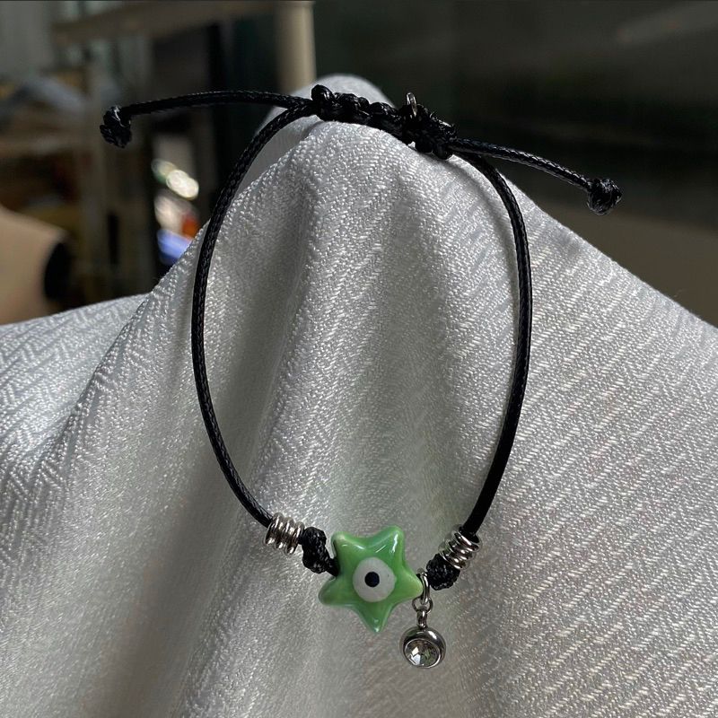 Vòng tay mặt mắt quỷ ngôi sao-trái tim bằng sứ Madde/2985