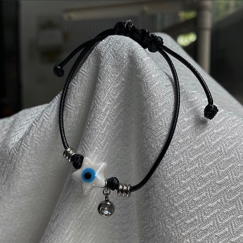 Vòng tay mặt mắt quỷ ngôi sao-trái tim bằng sứ Madde/2985