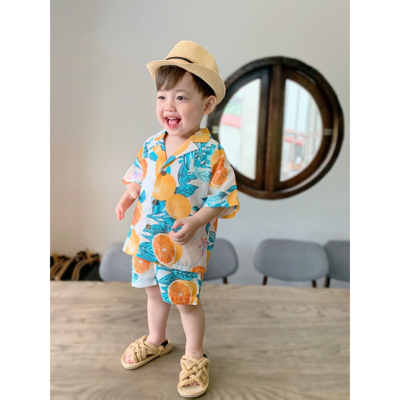 Bộ đồ đi biển bé trai, hoạ tiết hoa lá, chất đũi siêu mát cho bé từ 8-22kg