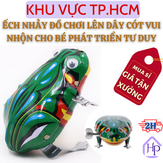 Ếch nhảy đồ chơi lên dây cót vui nhộn cho bé, đồ chơi con ếch nhảy lên dây cót giúp bé phát triển kĩ năng