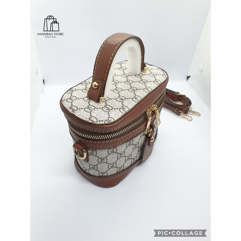 Túi xách đeo chéo Trống cơm quai nâu hoạ tiết Trắng