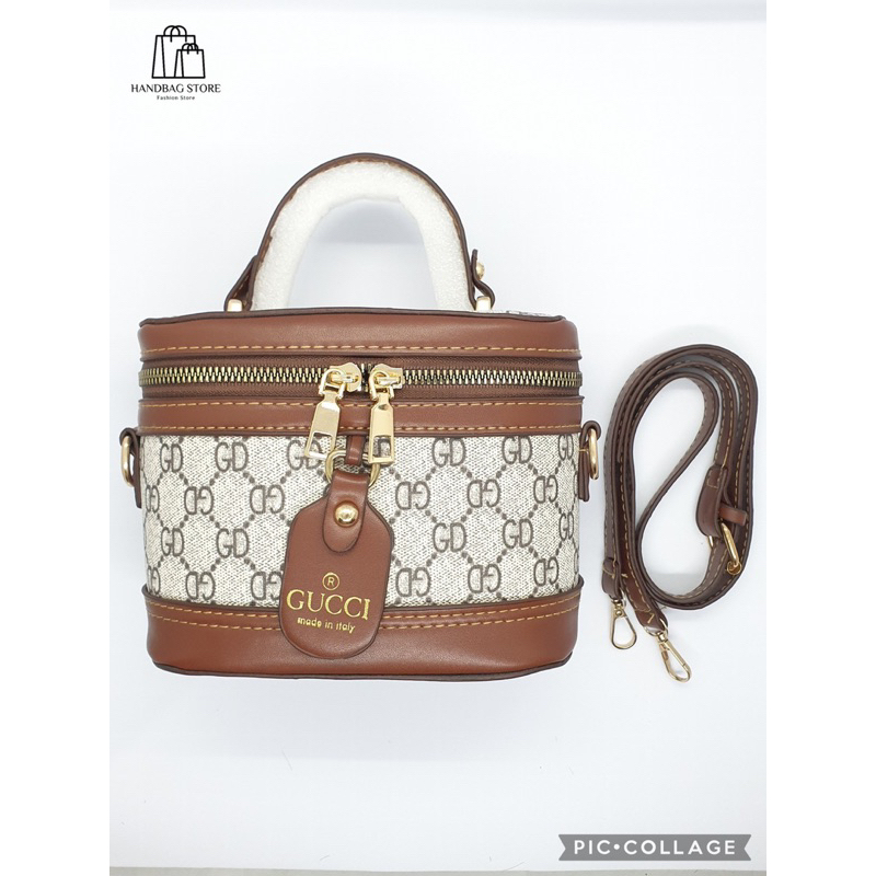 Túi xách đeo chéo Trống cơm quai nâu hoạ tiết Trắng