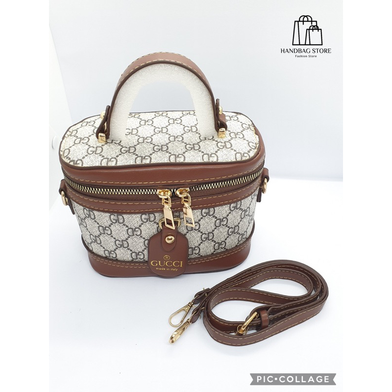 Túi xách đeo chéo Trống cơm quai nâu hoạ tiết Trắng