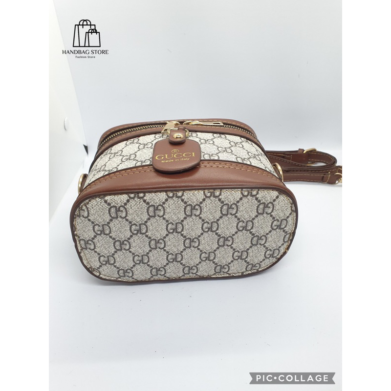 Túi xách đeo chéo Trống cơm quai nâu hoạ tiết Trắng