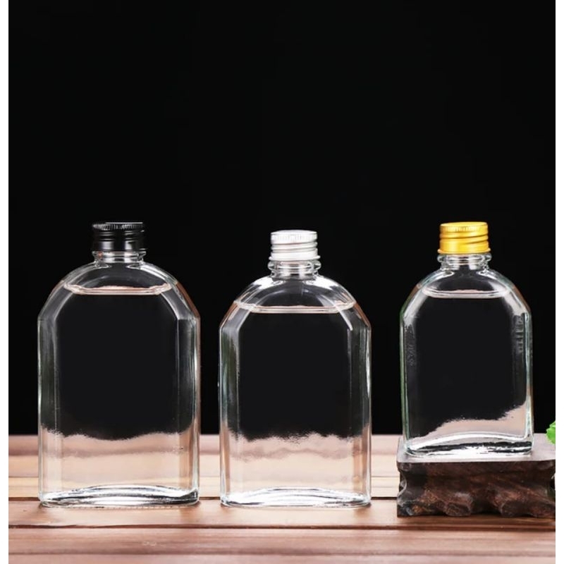 Chai thủy tinh dẹt vuông xén vai