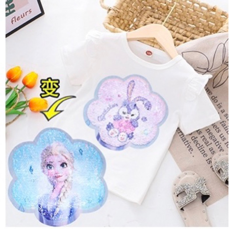 Áo thun kim sa lật đổi hình cho bé gái.