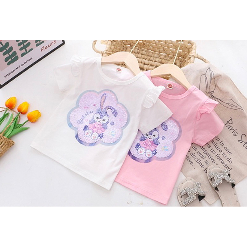 Áo thun kim sa lật đổi hình cho bé gái.