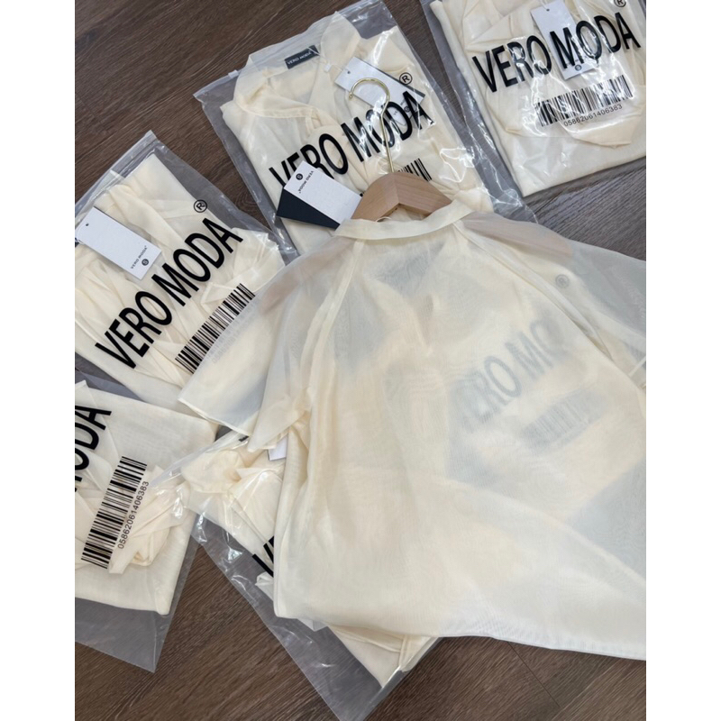 Áo sơmi tơ thắt nơ cổ