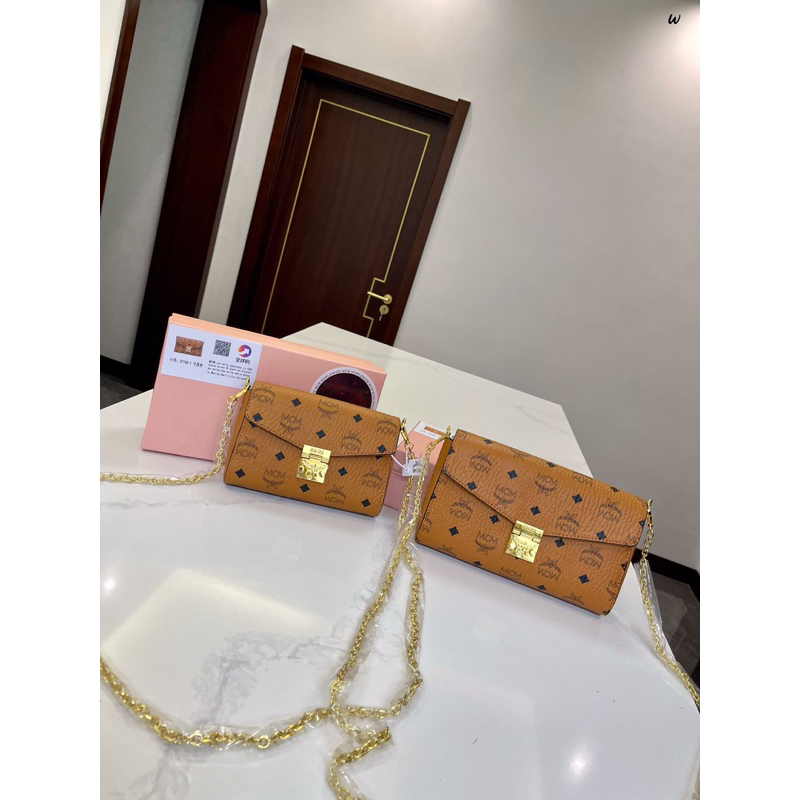 Ví M....CM,túi m.....cm,ví cầm tay,túi đeo chéo,túi hồng nữ tính,túi nữ đeo chéo