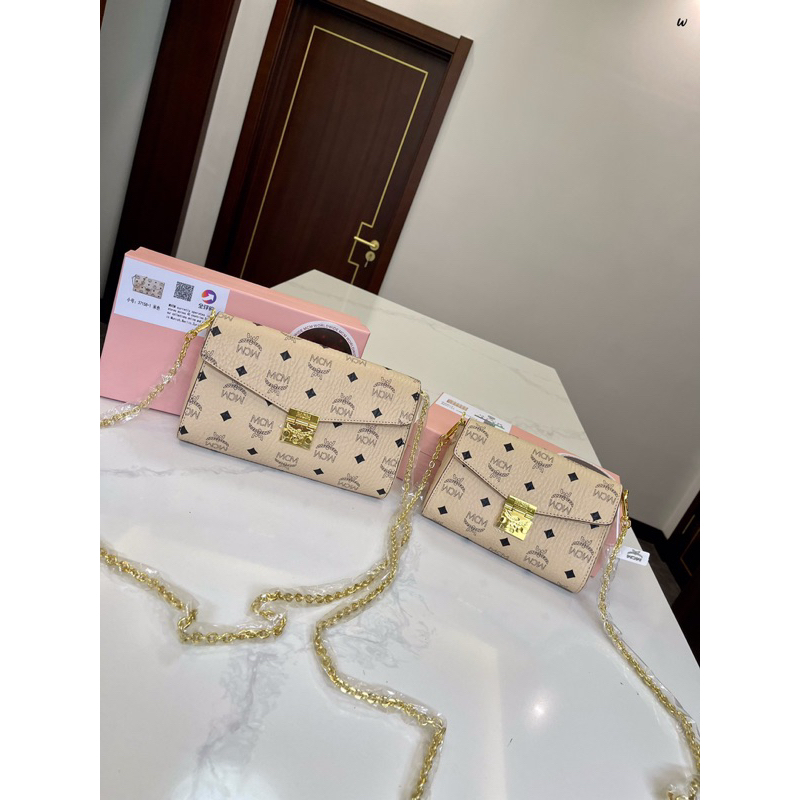 Ví M....CM,túi m.....cm,ví cầm tay,túi đeo chéo,túi hồng nữ tính,túi nữ đeo chéo