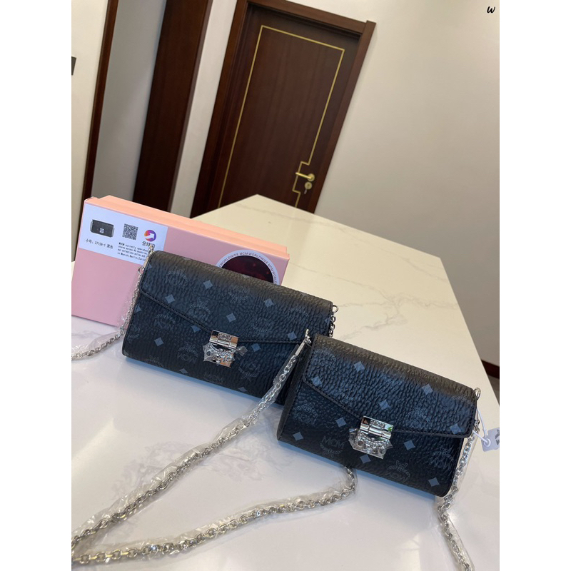 Ví M....CM,túi m.....cm,ví cầm tay,túi đeo chéo,túi hồng nữ tính,túi nữ đeo chéo