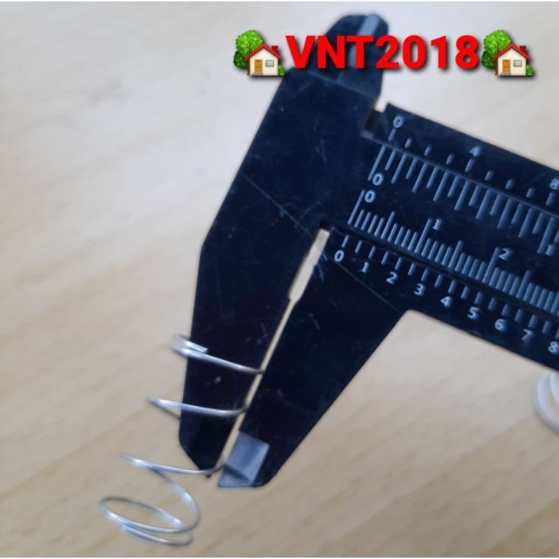 Lò xo nén inox phi 13.5mm sợi 0.6mm dài 24mm