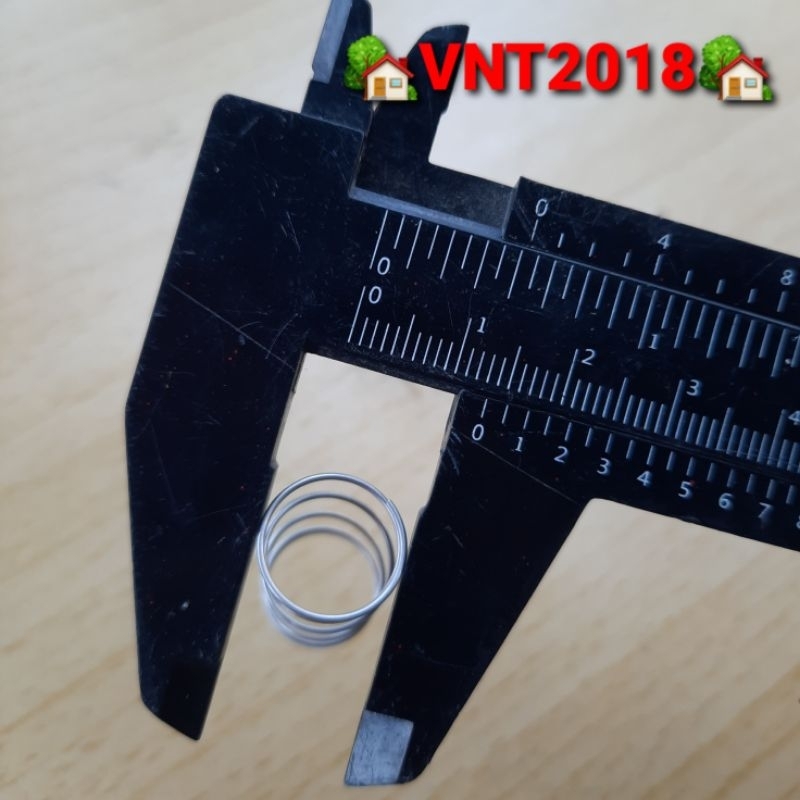 Lò xo nén inox phi 13.5mm sợi 0.6mm dài 24mm