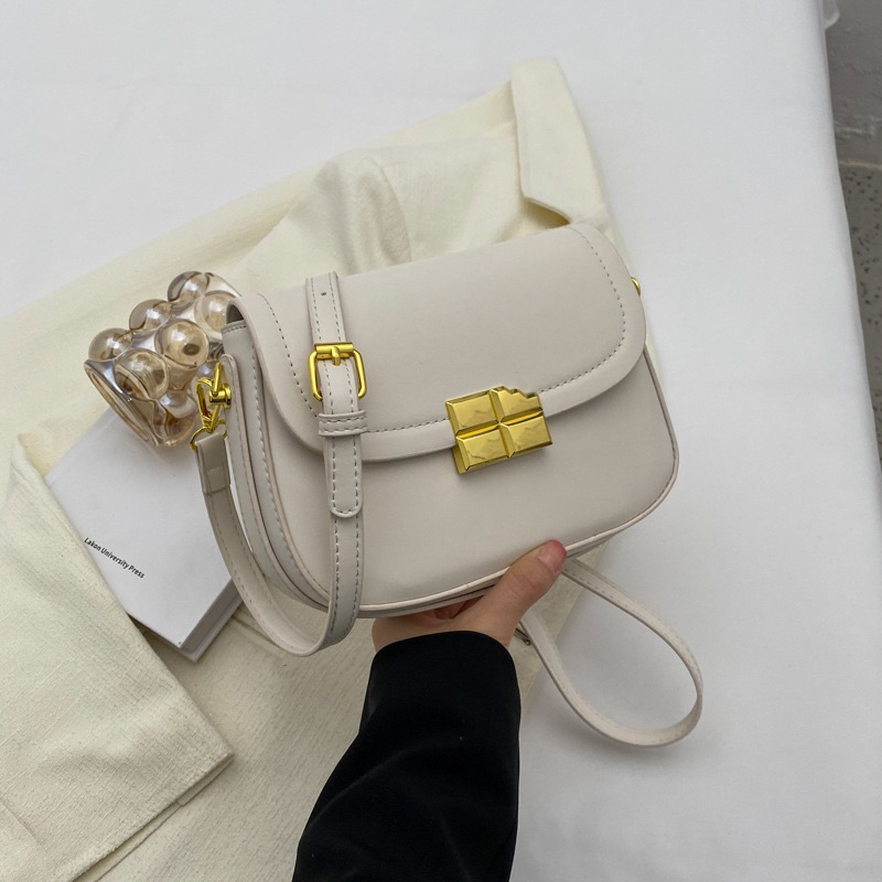 Túi đeo chéo khoá mặt vỡ da trơn có dây cầm tay mẫu mới