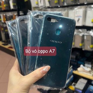 Bộ vỏ sườn oppo A7 zin - bộ gồm lưng, sườn và phím bấm. kính camera