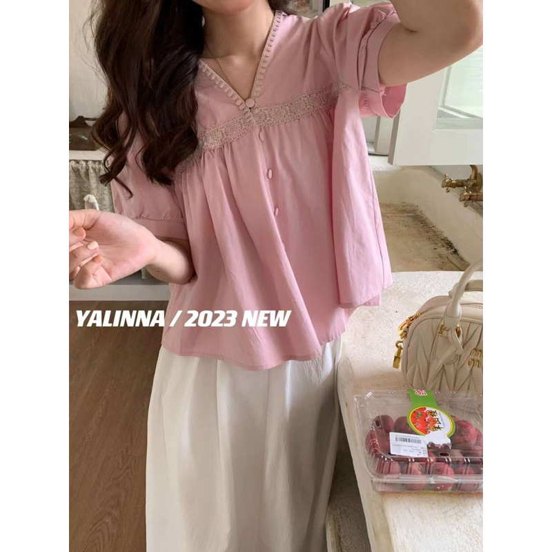 Áo sơ mi thô cổ V