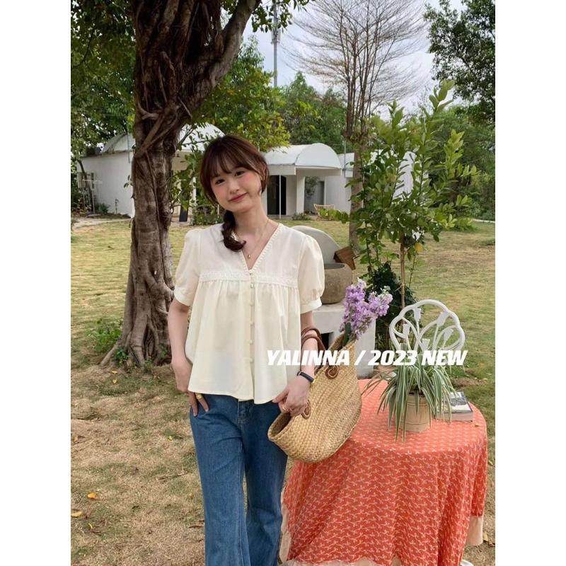 Áo sơ mi thô cổ V