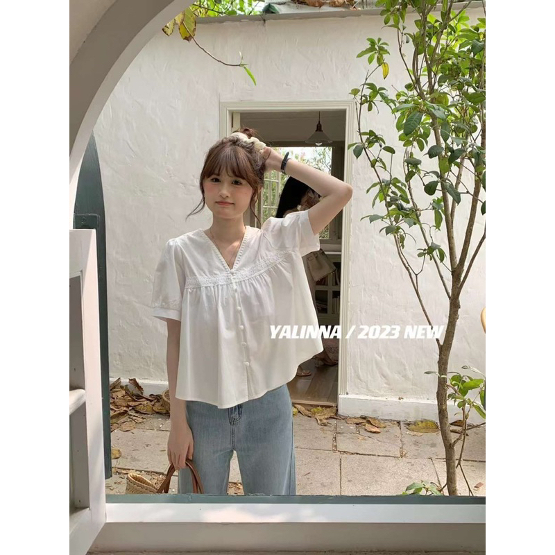 Áo sơ mi thô cổ V