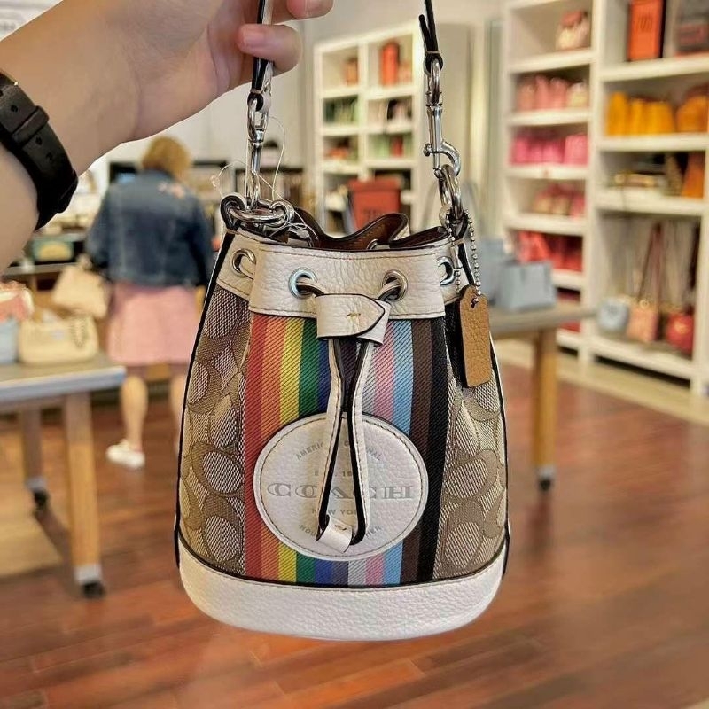 Coach Mini Dempsey Bucket Bag In Signature Jacquard With Rainbow Stripe And Coach Patch CJ661✨đeo chéo siêu dễ thương