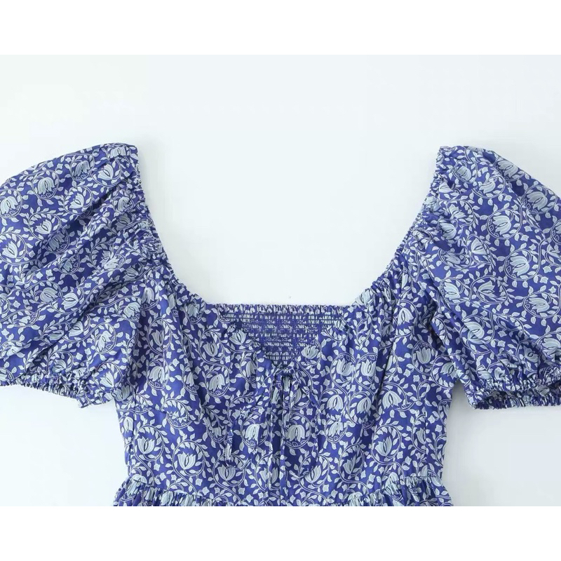 Đầm xoè hoạ tiết xanh