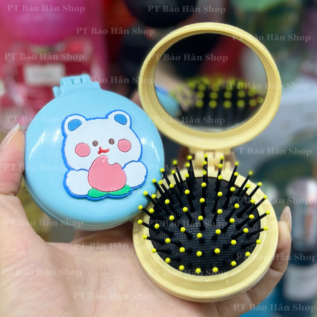 Gương kèm lược gấp gọn