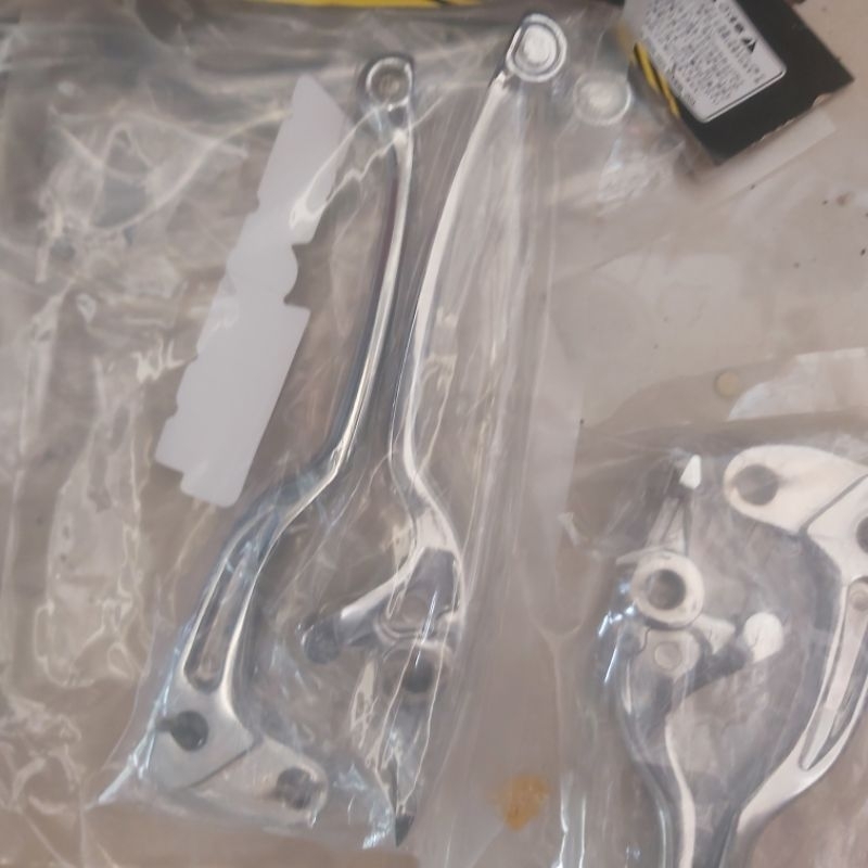 cặp tay thắng tay côn exciter 135 /150 trắng bạc xi ken