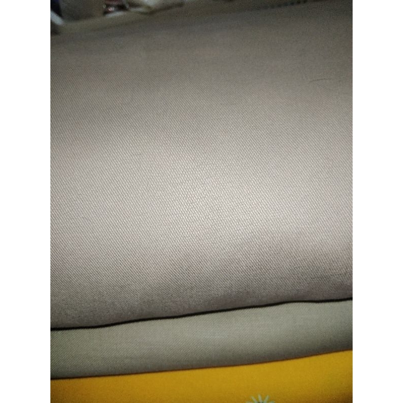 Vải kaki màu nâu nhạt may quần tây nam, quần tây nữ, váy nữ công sở