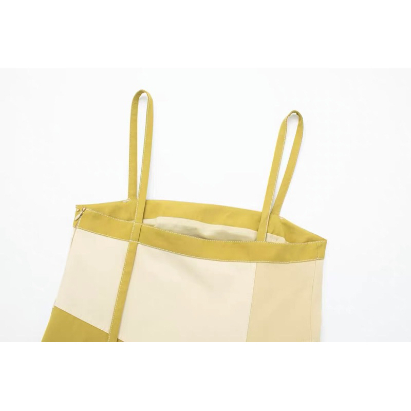 Đầm vàng hai dây