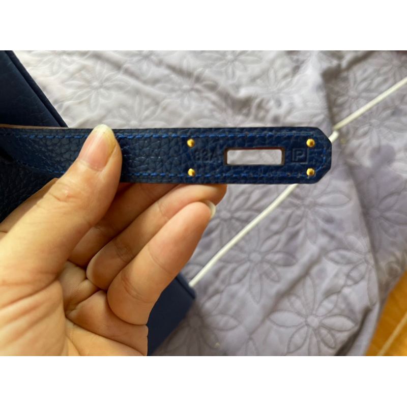 HM si hiệu da thật