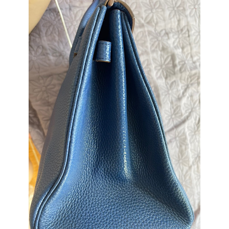 HM si hiệu da thật