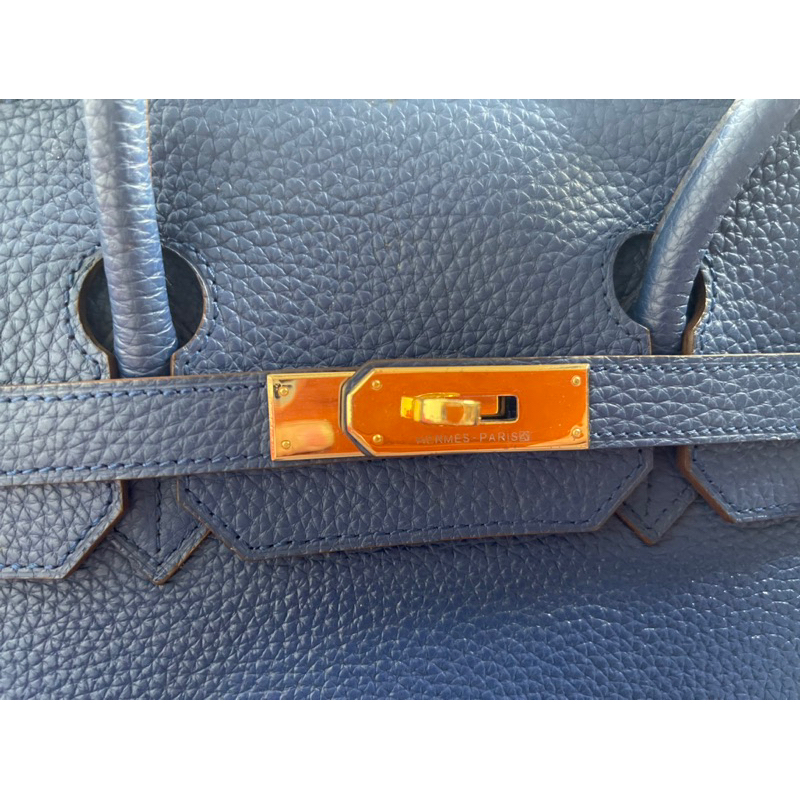 HM si hiệu da thật