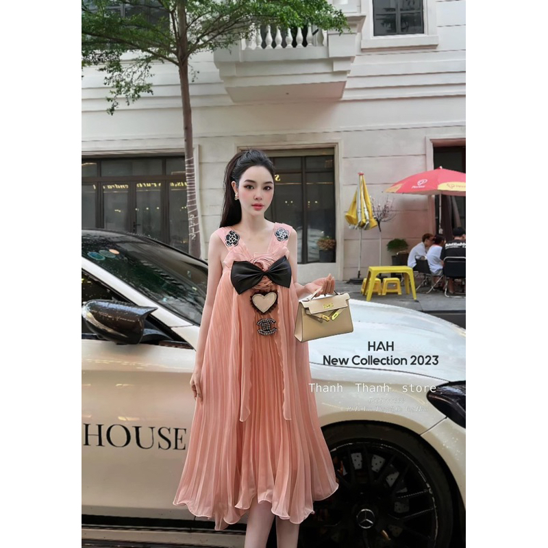 Đầm cao cấp xuông dập ly đính đá