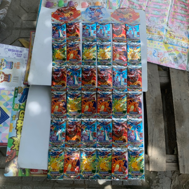 Túi thẻ bài pokemon phiên bản XYGO gồm 36 gói thẻ có vip