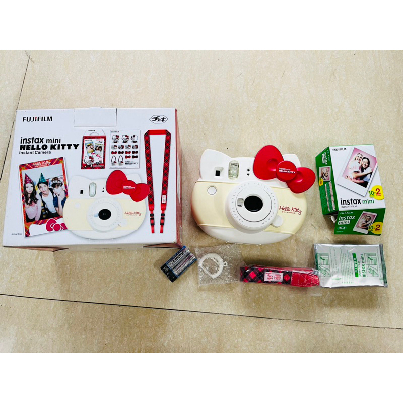 Máy chụp ảnh lấy liền Fujifilm Instax Mini Hello Kitty tặng kèm pin tiểu AA và 1 hộp film 10 tấm date 2024 | BigBuy360 - bigbuy360.vn