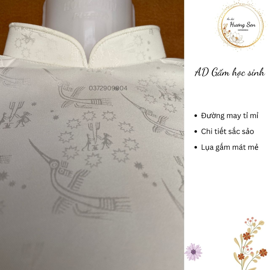 Áo dài gấm học sinh họa tiết chim hạc