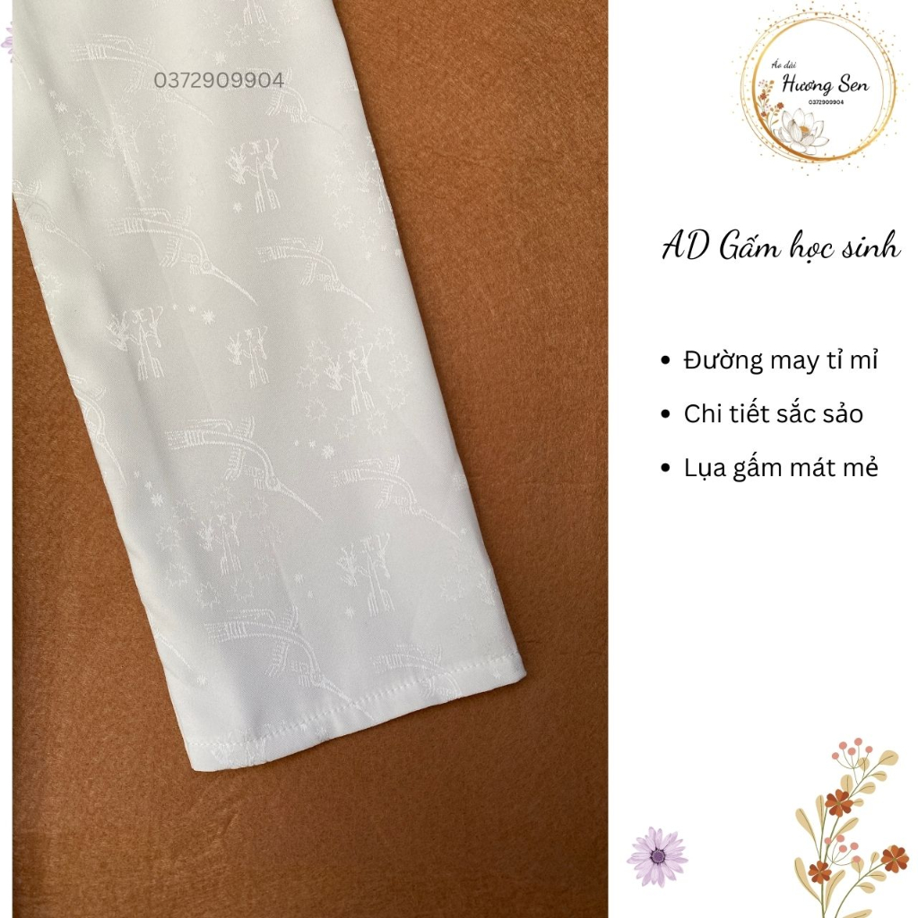Áo dài gấm học sinh họa tiết chim hạc