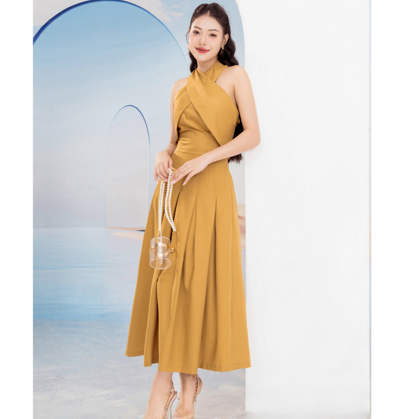 Set bộ áo kiểu bắt chéo thắt nơ sau cùng chân váy xòe HeraDG giúp khoe vai duyên dáng, khoe nét đẹp phần eo STBC2014A