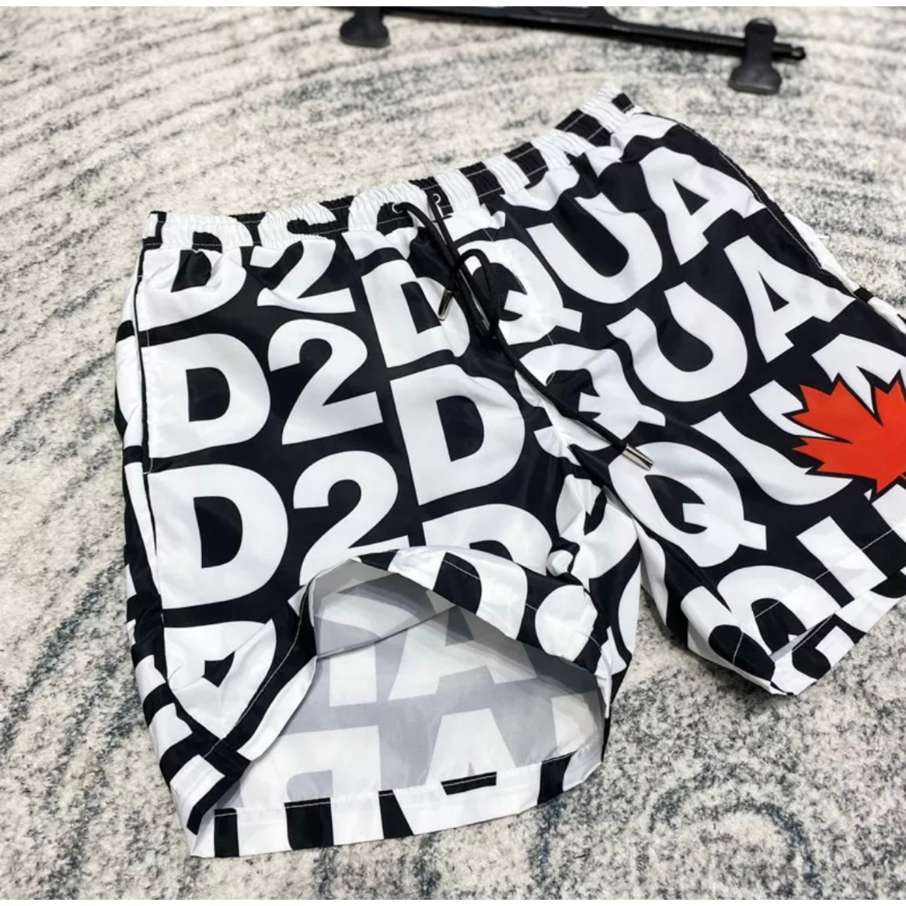 Quần Short Gió Nam Đi Biển DSQ2 Lá Hoạ Tiết Chữ Monogram Đen Trắng Dập Hình Lá Phong Đỏ Hàng Cao Cấp Siêu Hot
