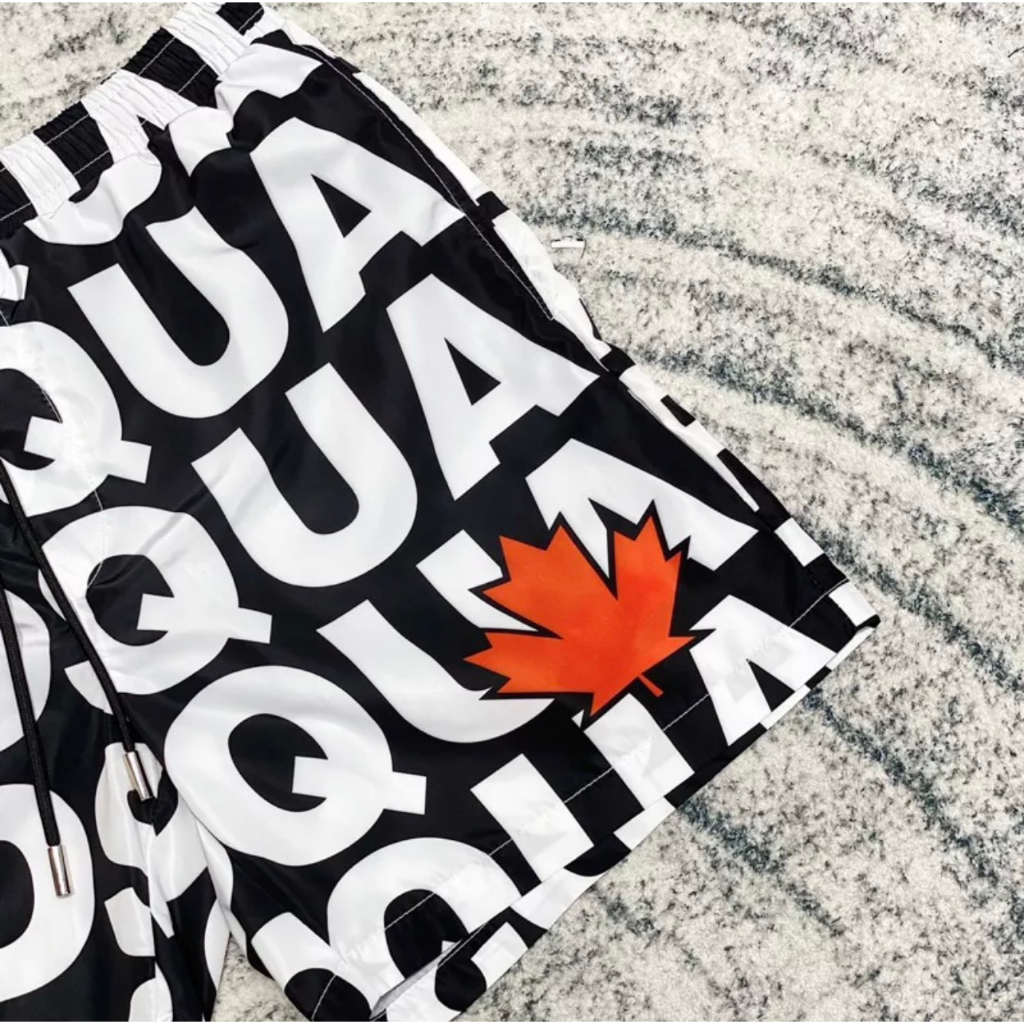 Quần Short Gió Nam Đi Biển DSQ2 Lá Hoạ Tiết Chữ Monogram Đen Trắng Dập Hình Lá Phong Đỏ Hàng Cao Cấp Siêu Hot