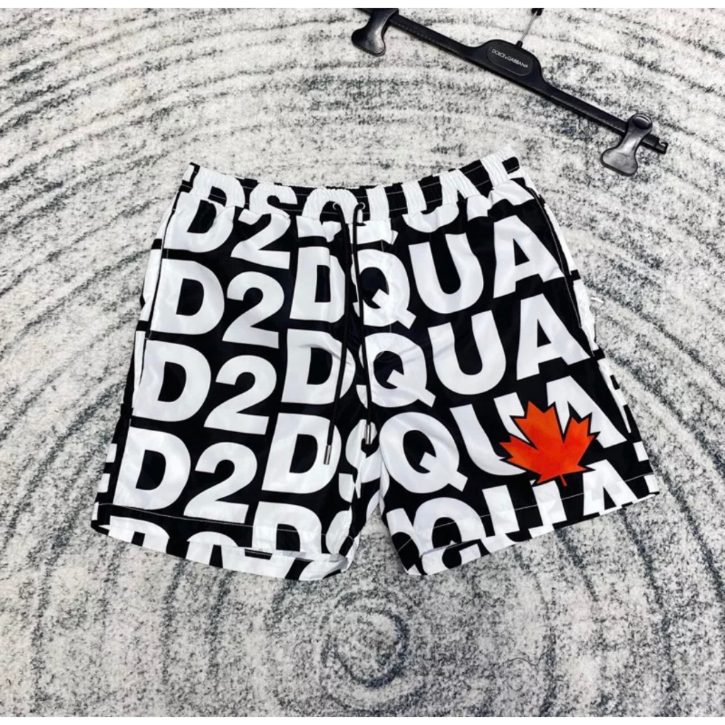 Quần Short Gió Nam Đi Biển DSQ2 Lá Hoạ Tiết Chữ Monogram Đen Trắng Dập Hình Lá Phong Đỏ Hàng Cao Cấp Siêu Hot
