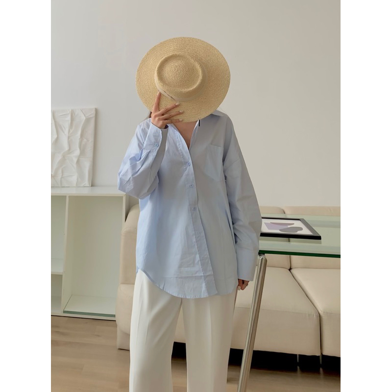 Áo sơ mi xanh pastel