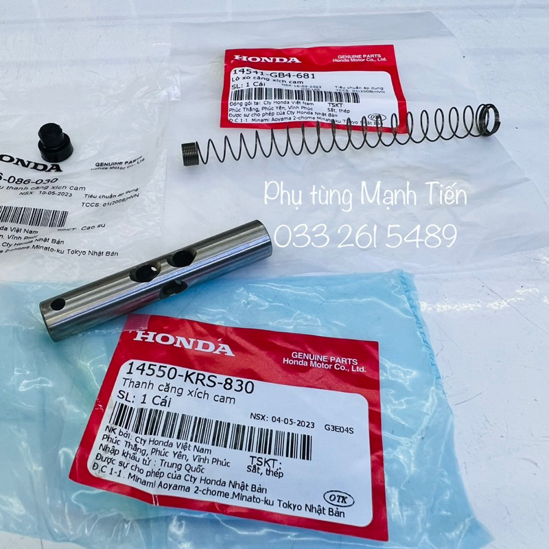 Lò xo+ ống sáo/ thanh căng xích cam + cao su chính hãng