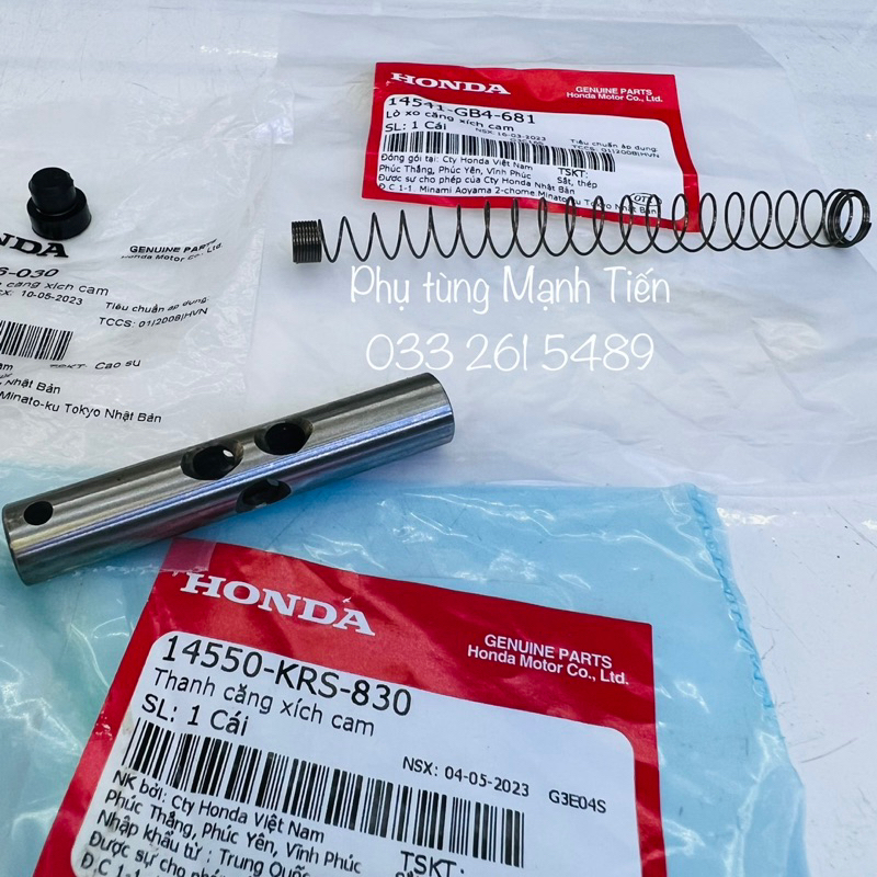 Lò xo+ ống sáo/ thanh căng xích cam + cao su chính hãng