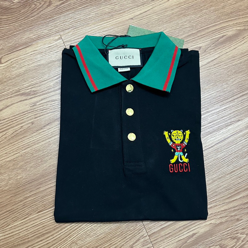 Áo polo GC rau của quả new 2310