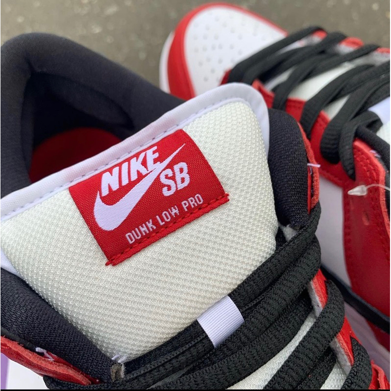 Giày SB Dunk Low Chicago Bred White Lai Au