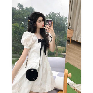 Đầm babydoll trắng kèm nơ đen