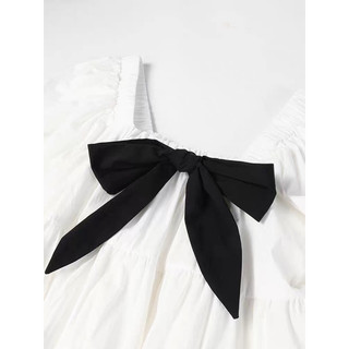 Đầm babydoll trắng kèm nơ đen